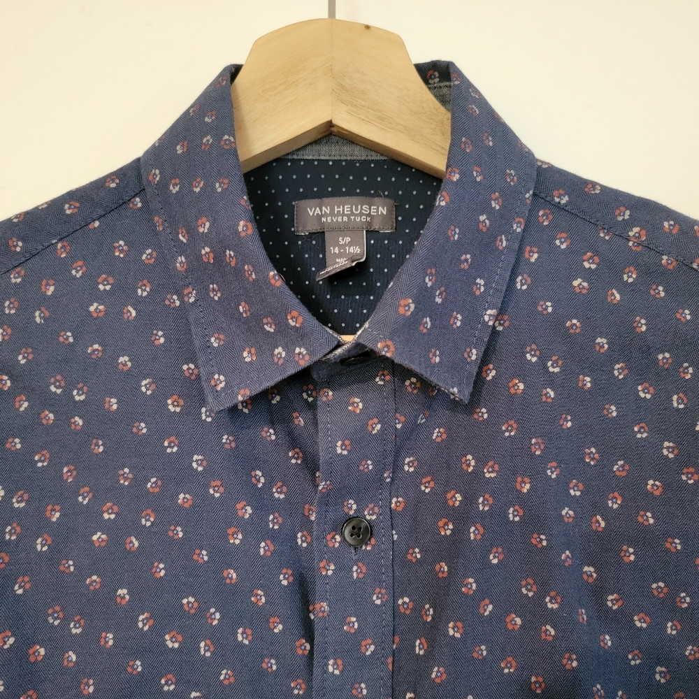 Size small floral button down shirt "never tuck"